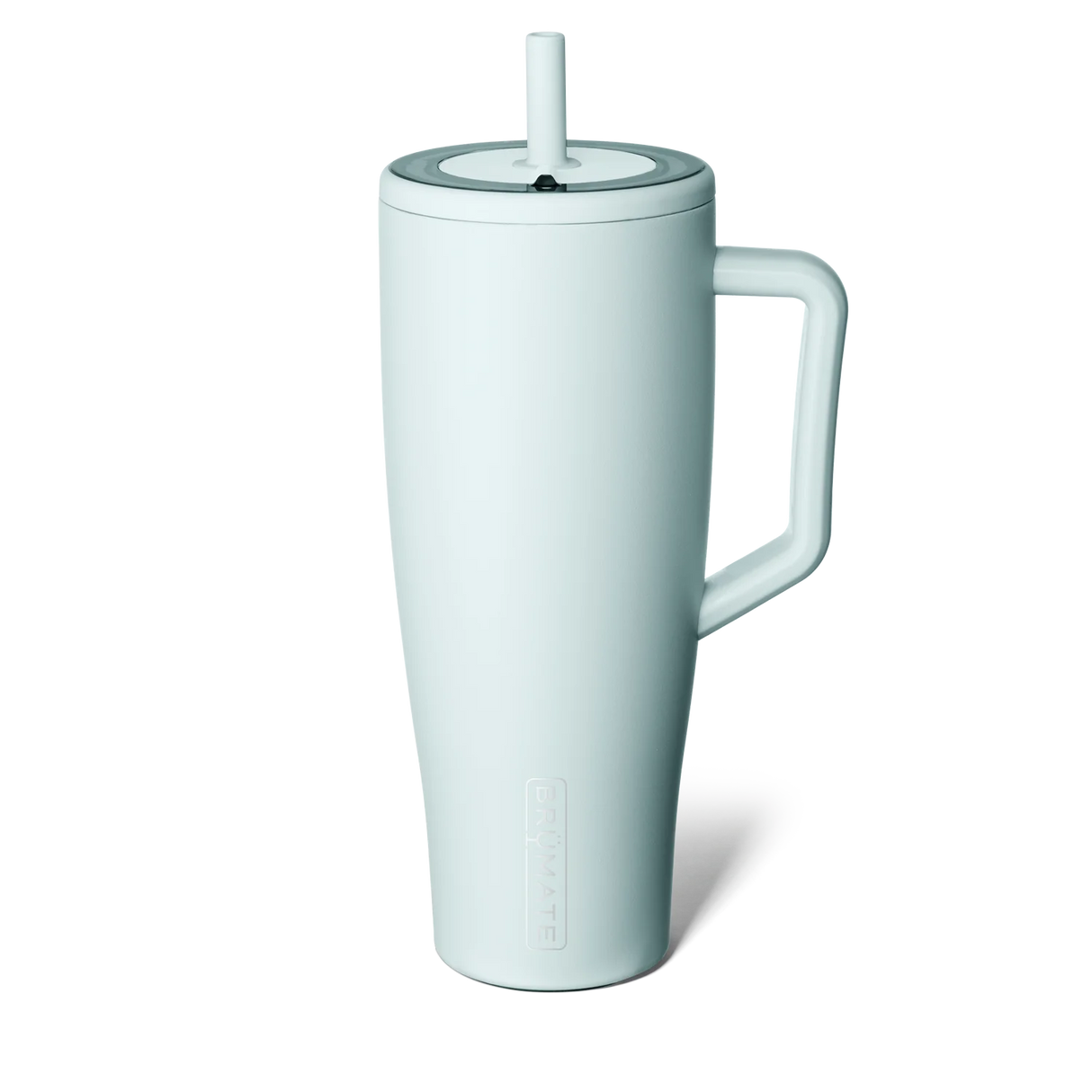 White mug with handle and straw on a white background