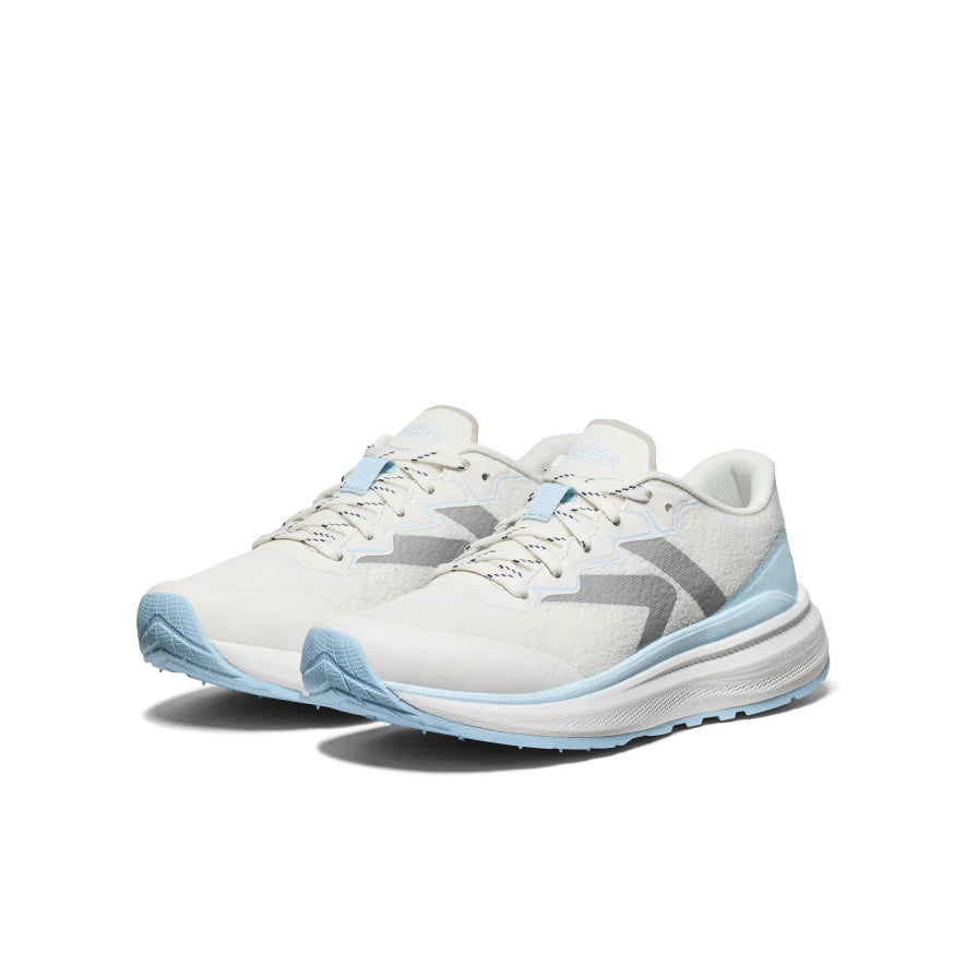 White and light blue running shoes on a white background
