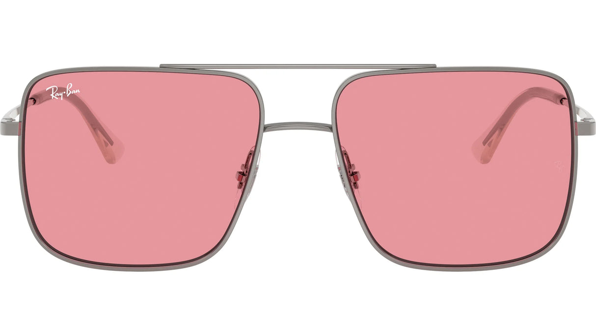 Sunglasses with pink lenses and silver frame on a white background