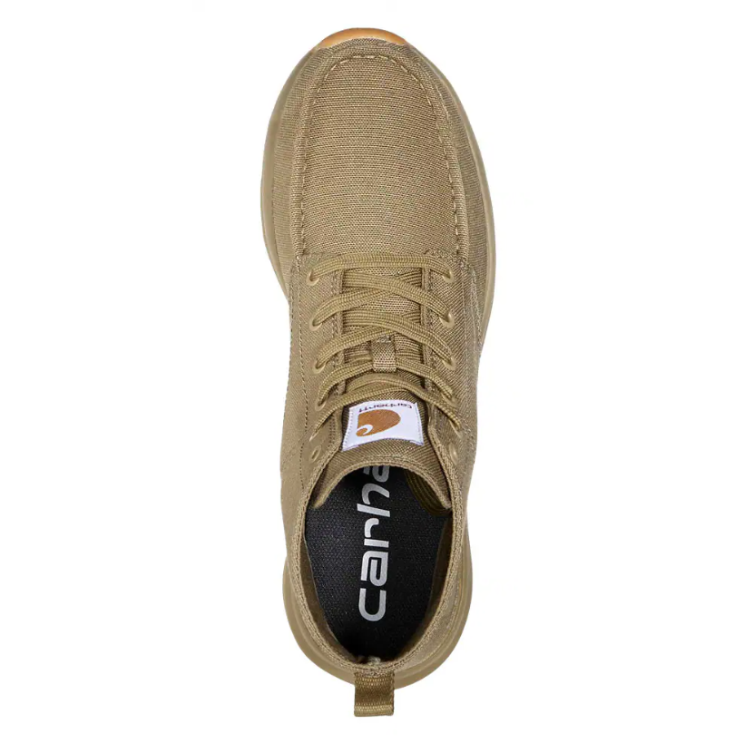 Tan sneaker with brand logo on a white background