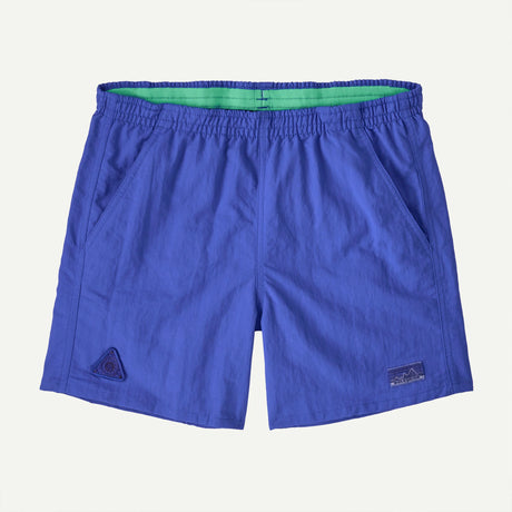 Blue shorts with a brand logo on a white background