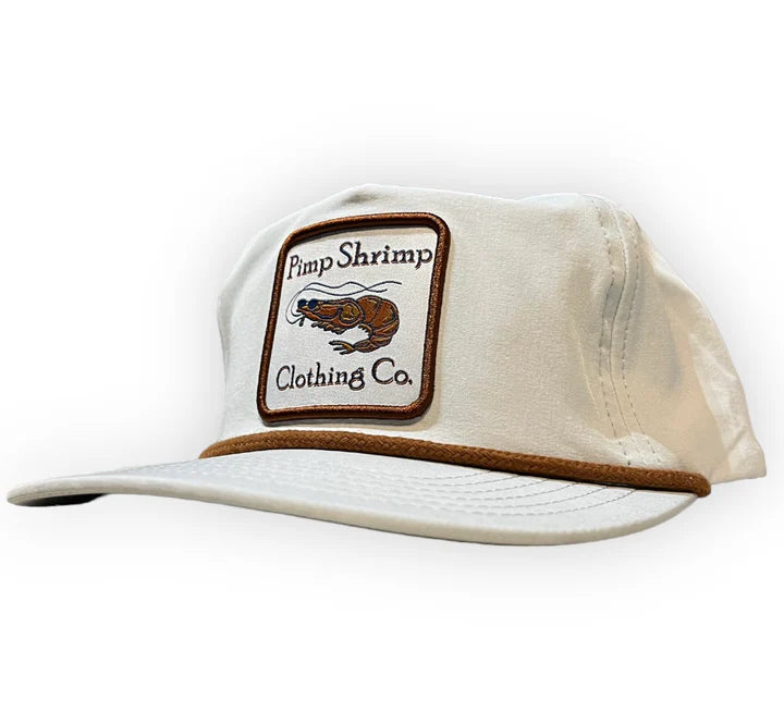 Beige cap with brown rim and 'Pimp Shrimp Clothing Co.' logo on a white background