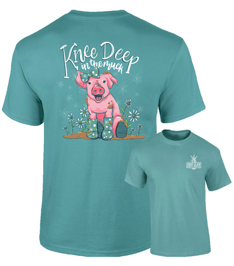 Teal t-shirt with a pig graphic and text on a white background