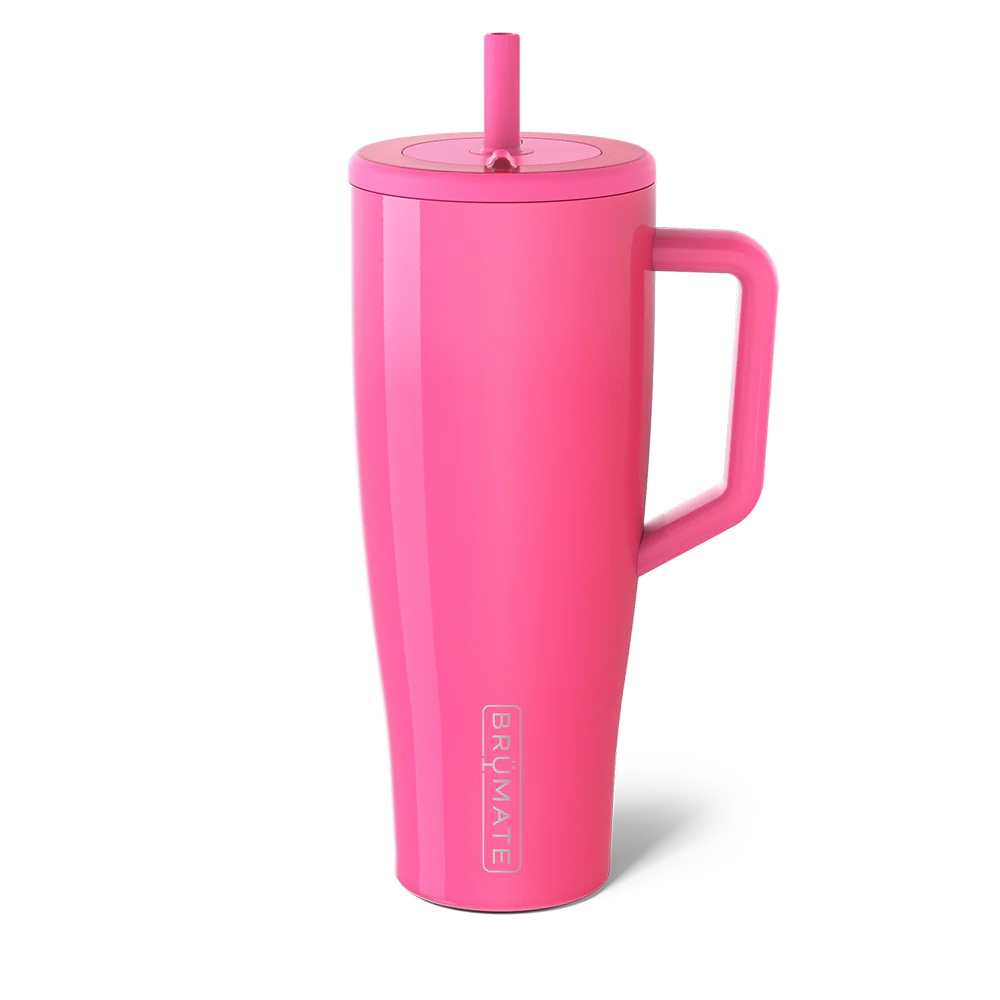 Pink insulated mug with handle and straw lid on a white background