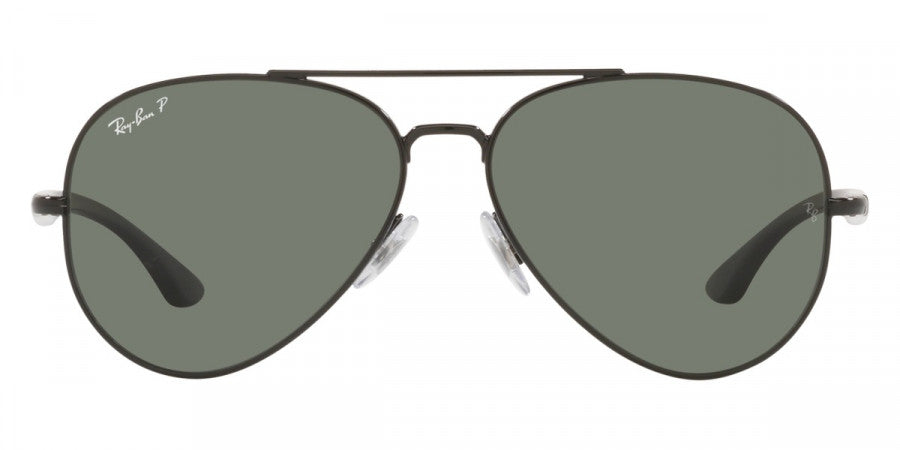 Aviator sunglasses with dark lenses on a white background