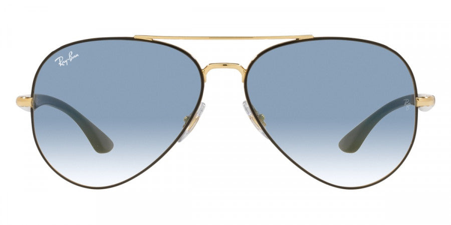 Aviator sunglasses with gold frame and blue gradient lenses on a white background