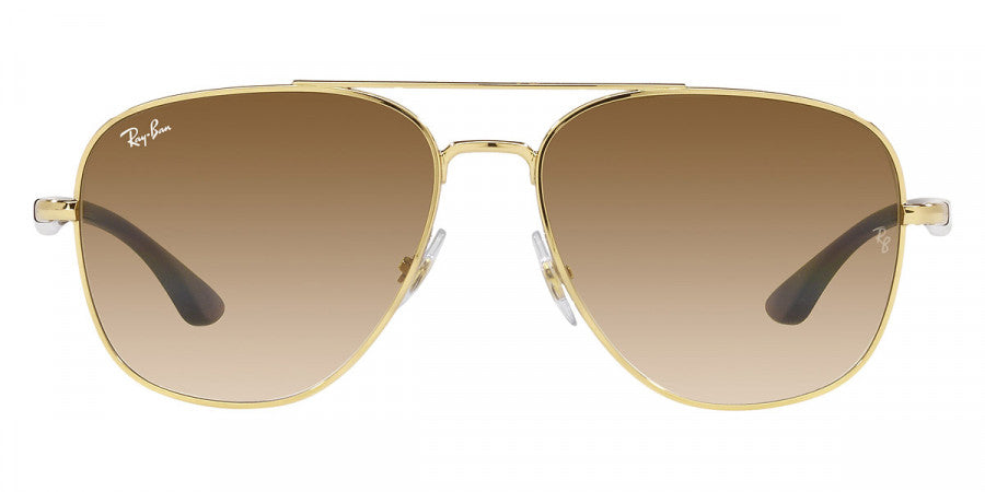 Gold-framed sunglasses with brown gradient lenses on a white background