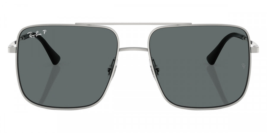 Silver sunglasses with dark lenses on a white background
