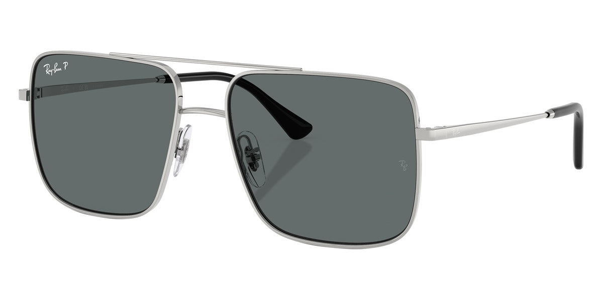 Silver sunglasses with dark lenses on a white background