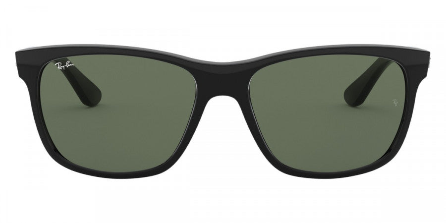 Black sunglasses with green lenses on a white background