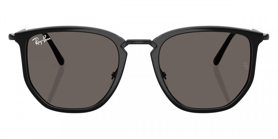 Black sunglasses with dark lenses on a white background