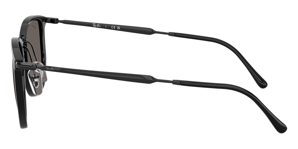 Black sunglasses with thin frames on a white background