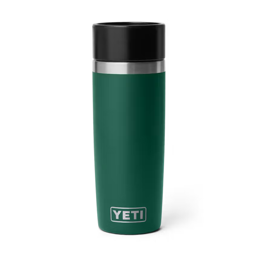 Green YETI mug with black lid on a white background