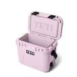 Pink YETI cooler with open lid on a white background