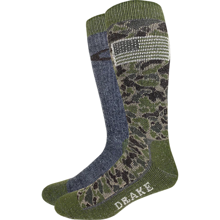 Two pairs of camouflage socks with 'Drake' branding on a white background