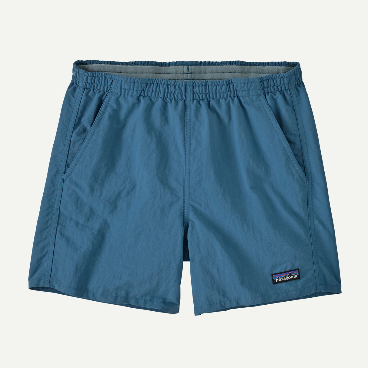 Blue shorts with a Patagonia logo on a light gray background