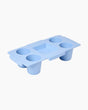 Blue silicone ice cube tray on a white background