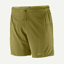 Green shorts with a drawstring on a white background