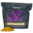 Domain Bad Habit attractant package with gold powder on a white background
