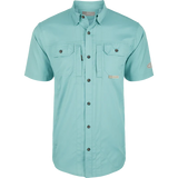 Light blue button-up shirt with short sleeves on a white background