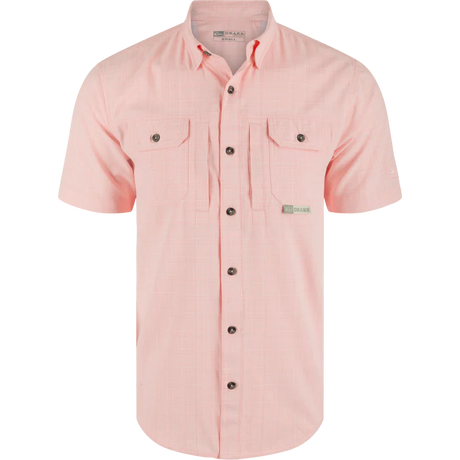 Pink short-sleeve shirt with button details on a white background