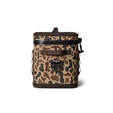 Camouflage-patterned backpack on a white background