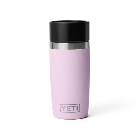 Pink YETI mug with black lid on a white background