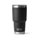 Black YETI tumbler with silver lid on a white background