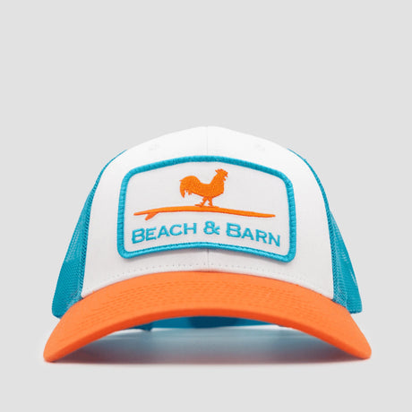 White and orange cap with 'Beach & Barn' logo on a gray background