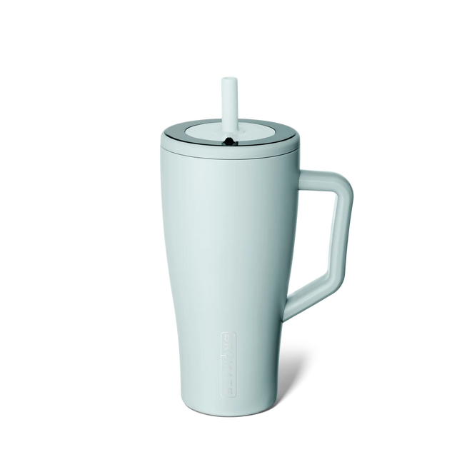 Light blue mug with handle and straw on a white background
