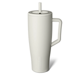White ceramic mug with handle and straw lid on a white background