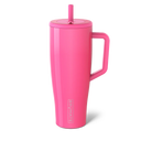 Pink insulated mug with handle and straw lid on a white background