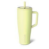 Light green insulated mug with handle and straw lid on a white background