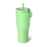 Green tumbler with a straw on a white background