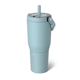 Light blue tumbler with a straw on a white background