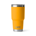 Yellow YETI tumbler on a white background