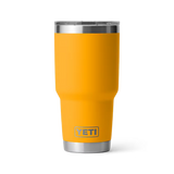Yellow YETI tumbler on a white background
